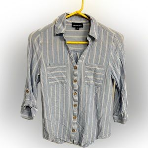 Light blue and white women’s button down shirt.